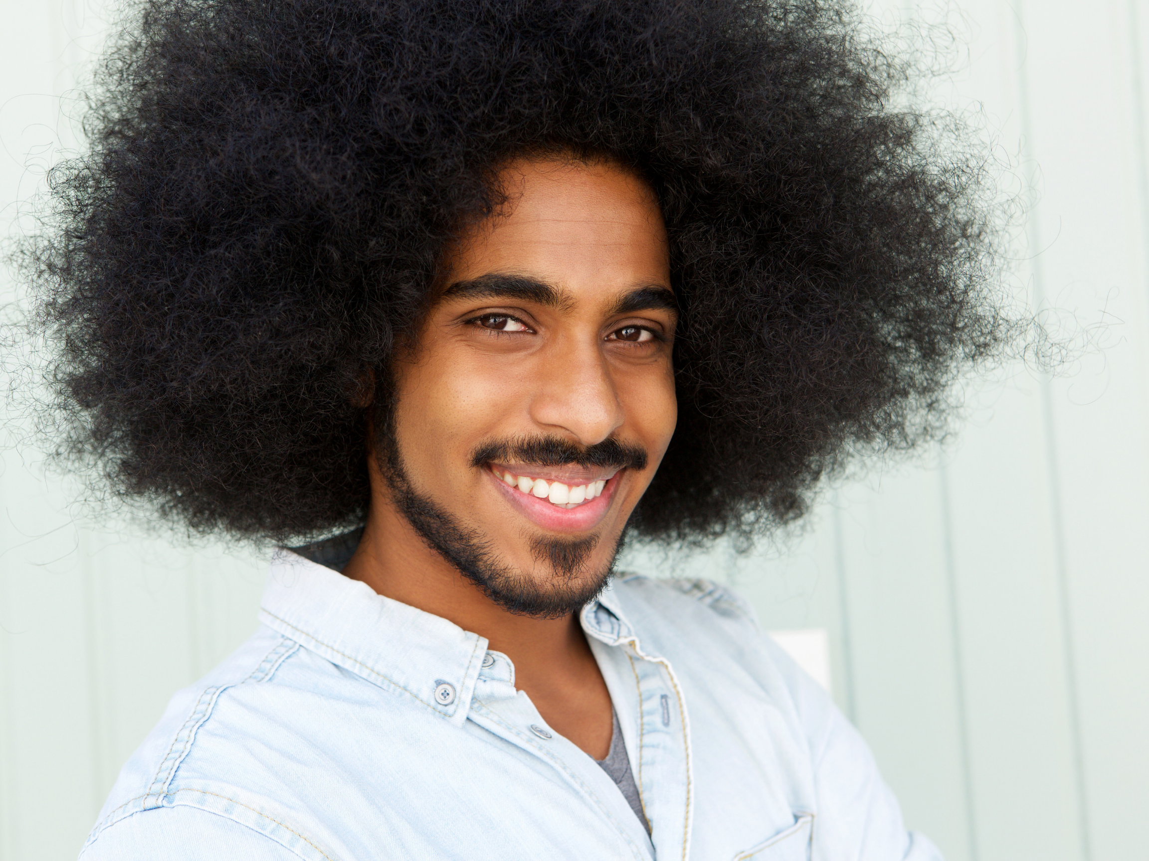 Black Man w Long Hair Smiling